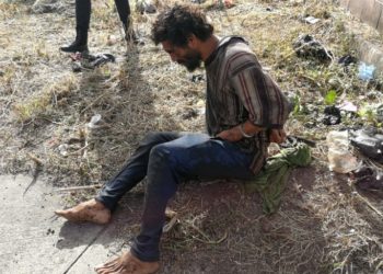 Policía captura a hombre que lanzaba un cadáver en barrio Modelo