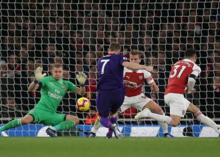 Pep Guardiola sonríe tras el empate del Liverpool contra el Arsenal