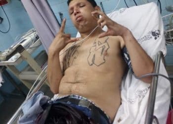 Marero baleado reta a policía desde la cama del hospital