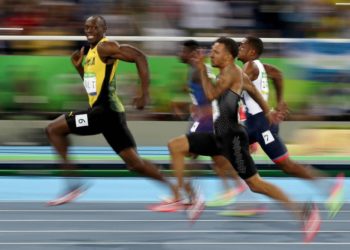 Usain Bolt destaca la importancia del distanciamiento social con su mejor foto olímpica