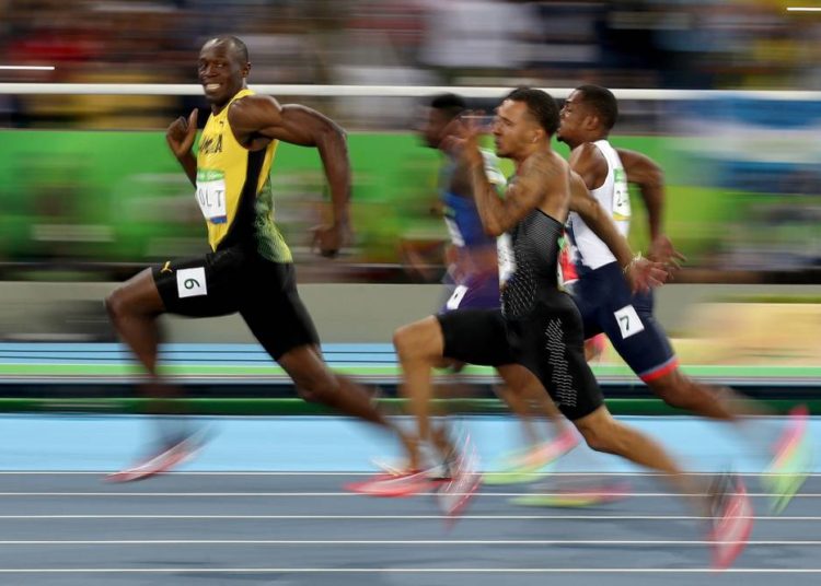 Usain Bolt destaca la importancia del distanciamiento social con su mejor foto olímpica