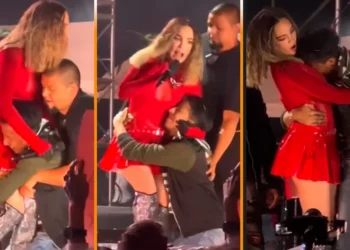(VIDEO) Belinda vive el susto de su vida en pleno escenario ante un fan que se aferra a ella