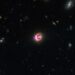 El Telescopio James Webb descubrió una galaxia y su agujero negro, a seis mil millones de años luz